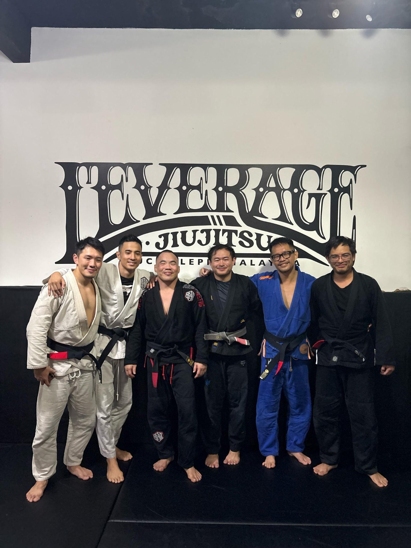Leverage BJJ black belt instructors in gi at the academy